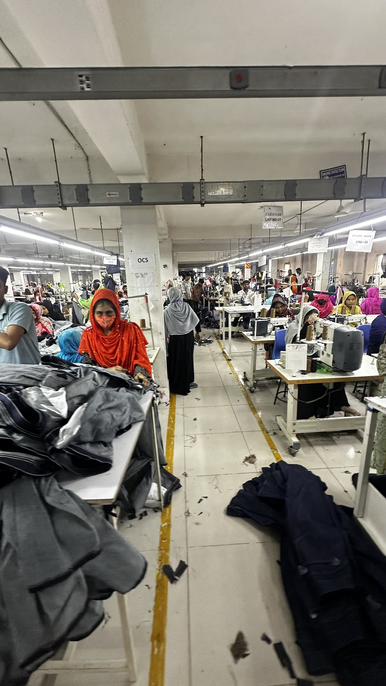Sewing lines across the Dhaka floor